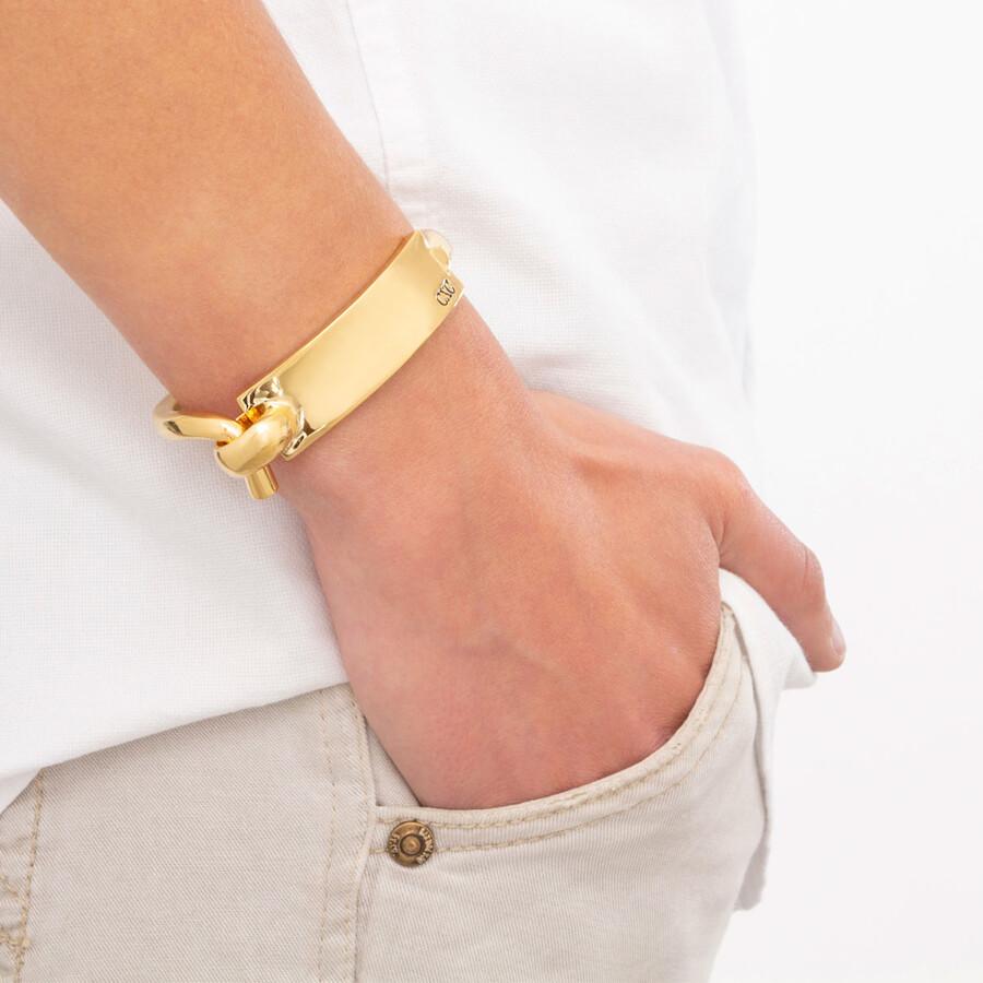 Foto de Detalle de Pulsera en baño de Oro con modelo de CXC