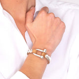 Foto de Detalle de Pulsera en baño de Plata con modelo de CXC