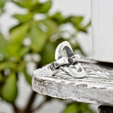 Foto de Detalle de Anillo en baño de Plata con modelo de CXC